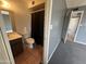 Bathroom with gray walls and black shower curtain at 4537 E Hidalgo Ave, Phoenix, AZ 85040