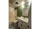 Bathroom featuring a shower-tub combo, updated vanity and great lighting at 4537 E Hidalgo Ave, Phoenix, AZ 85040