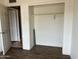 Bedroom featuring a closet and hardwood floors at 4537 E Hidalgo Ave, Phoenix, AZ 85040