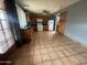 Spacious kitchen with oak cabinets, tile flooring, and stainless steel appliances at 4537 E Hidalgo Ave, Phoenix, AZ 85040
