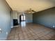 Living room featuring tile flooring and fireplace at 4537 E Hidalgo Ave, Phoenix, AZ 85040