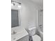 Bathroom with a tub and shower combination, white cabinets and sink, and neutral color scheme at 4644 E Southern Ave, Phoenix, AZ 85042