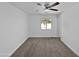Bedroom with plush carpeting, a ceiling fan, fresh paint, and a well-lit interior at 4644 E Southern Ave, Phoenix, AZ 85042
