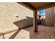 Covered patio with stone tiles in a backyard living space at 4744 E Tierra Buena Ln, Phoenix, AZ 85032