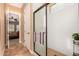 Bathroom featuring a glass shower, a neutral color palette, and access to the bedroom at 5523 W Yearling Rd, Phoenix, AZ 85083