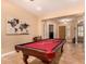 Pool table with wall map creates an inviting space for relaxation at 5523 W Yearling Rd, Phoenix, AZ 85083