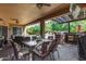 Outdoor patio featuring ample seating space, BBQ area and outdoor bar at 5523 W Yearling Rd, Phoenix, AZ 85083