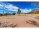 Enjoy a scenic sand volleyball court surrounded by beautiful mountain views and expansive open space at 5523 W Yearling Rd, Phoenix, AZ 85083