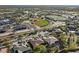 Aerial view of the neighborhood showcasing the home's proximity to the golf course and community at 5892 E Evening Glow Dr, Scottsdale, AZ 85266