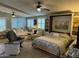 Comfortable bedroom area featuring a murphy bed, bright lighting, and inviting decor at 6161 S Pinehurst Dr, Chandler, AZ 85249
