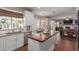 Well-designed kitchen with eat-in area flows into the living room at 6576 W Lone Cactus Dr, Glendale, AZ 85308