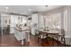 Gourmet kitchen features custom cabinets and breakfast nook at 6576 W Lone Cactus Dr, Glendale, AZ 85308