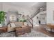 Spacious open-concept living room that seamlessly flows into the dining area at 6576 W Lone Cactus Dr, Glendale, AZ 85308