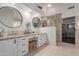 The spacious main bathroom includes dual sinks and a walk-in shower at 6576 W Lone Cactus Dr, Glendale, AZ 85308
