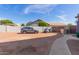 Large parking area showing room for car and golf cart at 6576 W Lone Cactus Dr, Glendale, AZ 85308
