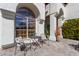 A covered patio showcases an outdoor seating area, perfect for entertaining at 6576 W Lone Cactus Dr, Glendale, AZ 85308