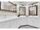 Bright bathroom featuring a double vanity with rustic framed mirrors and modern fixtures at 7006 E Jensen St # 33, Mesa, AZ 85207