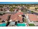 Aerial view of a single-Gathering home with a private pool, patio, and desert landscaping in a residential neighborhood at 751 W Elgin St, Chandler, AZ 85225