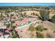 An aerial view of several single-Gathering homes with pools, tile roofs, and well-maintained yards, near a green space at 751 W Elgin St, Chandler, AZ 85225