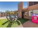 Backyard featuring outdoor seating and a pink playhouse with artificial turf at 751 W Elgin St, Chandler, AZ 85225