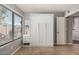 Bedroom with a murphy bed, tile floors, and a view of the backyard, offering a cozy and functional space at 751 W Elgin St, Chandler, AZ 85225