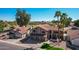 A beautiful home with three-car garage, well-kept lawn, complemented by palm trees in a well maintained neighborhood at 751 W Elgin St, Chandler, AZ 85225