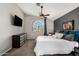 Spacious main bedroom featuring vaulted ceilings, carpet flooring, and an arched window at 751 W Elgin St, Chandler, AZ 85225