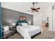 Comfortable main bedroom with carpet flooring, and a view to the en suite bathroom at 751 W Elgin St, Chandler, AZ 85225