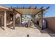 Outdoor patio featuring a dining table, chairs, pergola, pool and grill at 751 W Elgin St, Chandler, AZ 85225