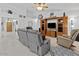 Inviting living room featuring an entertainment center, perfect for relaxing and entertaining at 7538 E Forge Ave, Mesa, AZ 85208