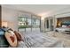 This bedroom boasts a large window with view and mirrored closet, providing ample natural light and storage space at 7601 E 2Nd St # 20, Scottsdale, AZ 85251