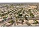 An aerial view showcases an expansive neighborhood, complete with private pools and lush landscaping between homes at 802 N Butte Ave, Chandler, AZ 85226