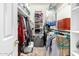 Walk-in closet with shelving for optimal organization and storage of clothing and accessories at 802 N Butte Ave, Chandler, AZ 85226