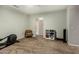 Versatile flex room with carpet flooring and space for a variety of activities at 802 N Butte Ave, Chandler, AZ 85226