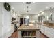 Open kitchen featuring granite countertops, stainless appliances, and a large island with storage at 802 N Butte Ave, Chandler, AZ 85226