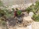 Aerial shot of a serene backyard patio setup with lush landscaping offering a tranquil outdoor living space at 802 N Butte Ave, Chandler, AZ 85226