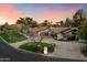 Aerial view of an estate featuring mature landscaping, circular driveway, and well manicured lawn at 8306 N Merion Way, Paradise Valley, AZ 85253