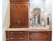 Bathroom featuring dark wood cabinets, marble countertop and vanity at 8306 N Merion Way, Paradise Valley, AZ 85253