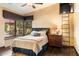 Comfortable bedroom featuring a bay window and a loft ladder, offering style and functionality at 8306 N Merion Way, Paradise Valley, AZ 85253
