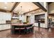 Gourmet kitchen with a large central island, custom cabinets, and modern appliances for cooking and entertaining at 8306 N Merion Way, Paradise Valley, AZ 85253