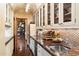 Stylish kitchen with custom cabinetry and countertops offers ample storage and workspace for cooking and food preparation at 8306 N Merion Way, Paradise Valley, AZ 85253