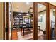 Classic office space with wood accents, built-in bookshelves, a spacious desk, and a comfortable executive chair at 8306 N Merion Way, Paradise Valley, AZ 85253