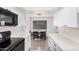 Bright and airy kitchen connected to the dining area, perfect for Gathering gatherings at 8532 E Belleview St, Scottsdale, AZ 85257