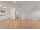 Spacious living room featuring hardwood floors, white walls, and a ceiling fan at 8823 E Billings St, Mesa, AZ 85207