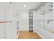 Large walk-in closet with installed shelving and wood floors at 8823 E Billings St, Mesa, AZ 85207
