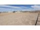 Expansive lot featuring desert landscaping and ample space for outdoor activities at 10856 W Arica Rd, Casa Grande, AZ 85193