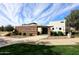 Attractive community center featuring stone accents, lush landscaping, and inviting entryway at 1293 E Clifton Ave, Gilbert, AZ 85295