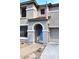 Charming two-story home featuring a blue front door and a well-maintained yard with walkway at 1293 E Clifton Ave, Gilbert, AZ 85295