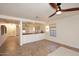 Bright living room featuring built-in cabinets, and tiled floors at 1293 E Clifton Ave, Gilbert, AZ 85295