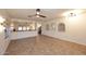 Spacious living room featuring tile floors, neutral walls, and ample natural light at 1293 E Clifton Ave, Gilbert, AZ 85295
